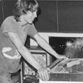 Wallflower lead singer Dave Rinck playing pinball, early '80s