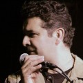 Lou Damian at mic; Lestat's, July 30, 2010 (Kymri Wilt)